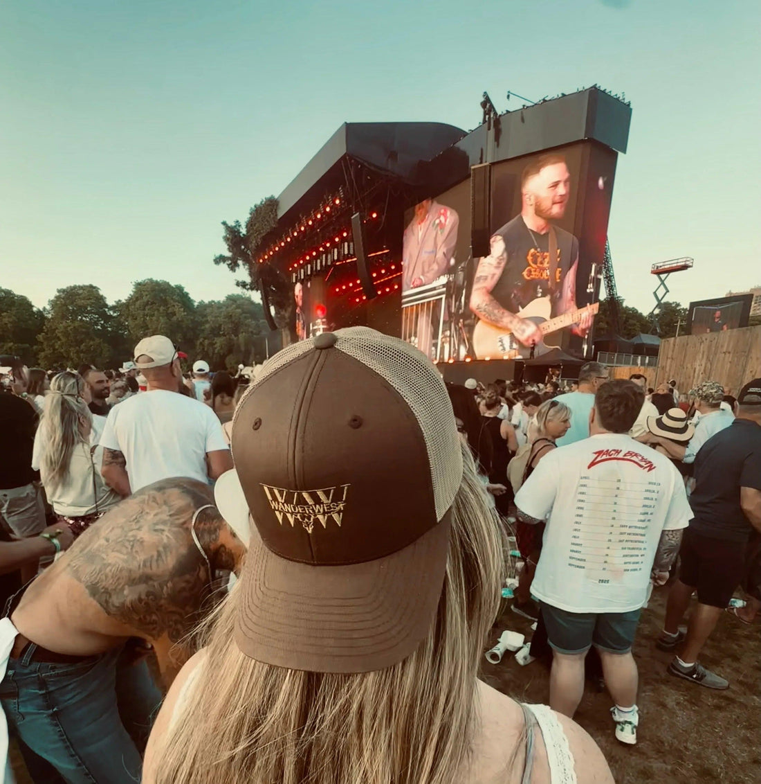 Rusted Barn Trucker hat styled for UK summer festival fashion and western streetwear aesthetic