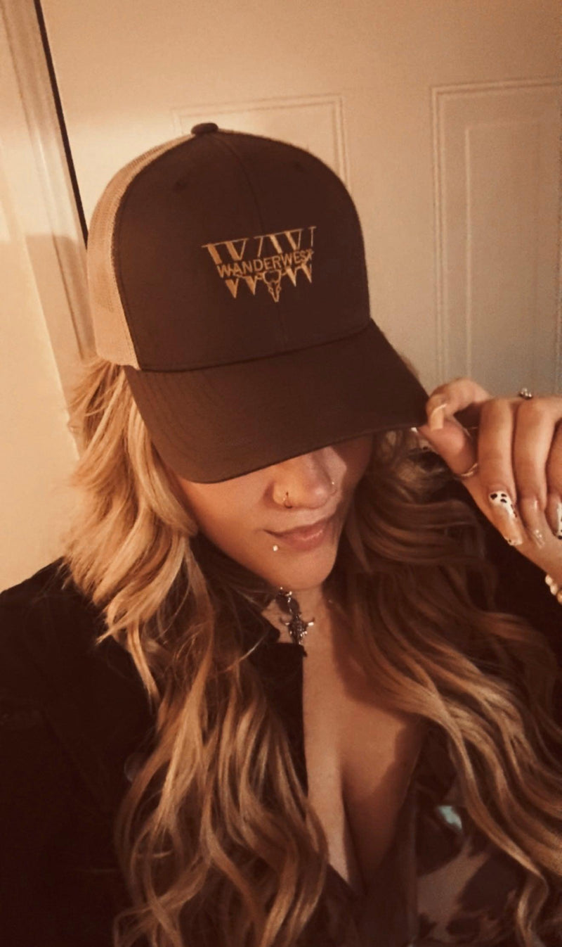 WanderWest UK customer photos — hats, hoodies, tees