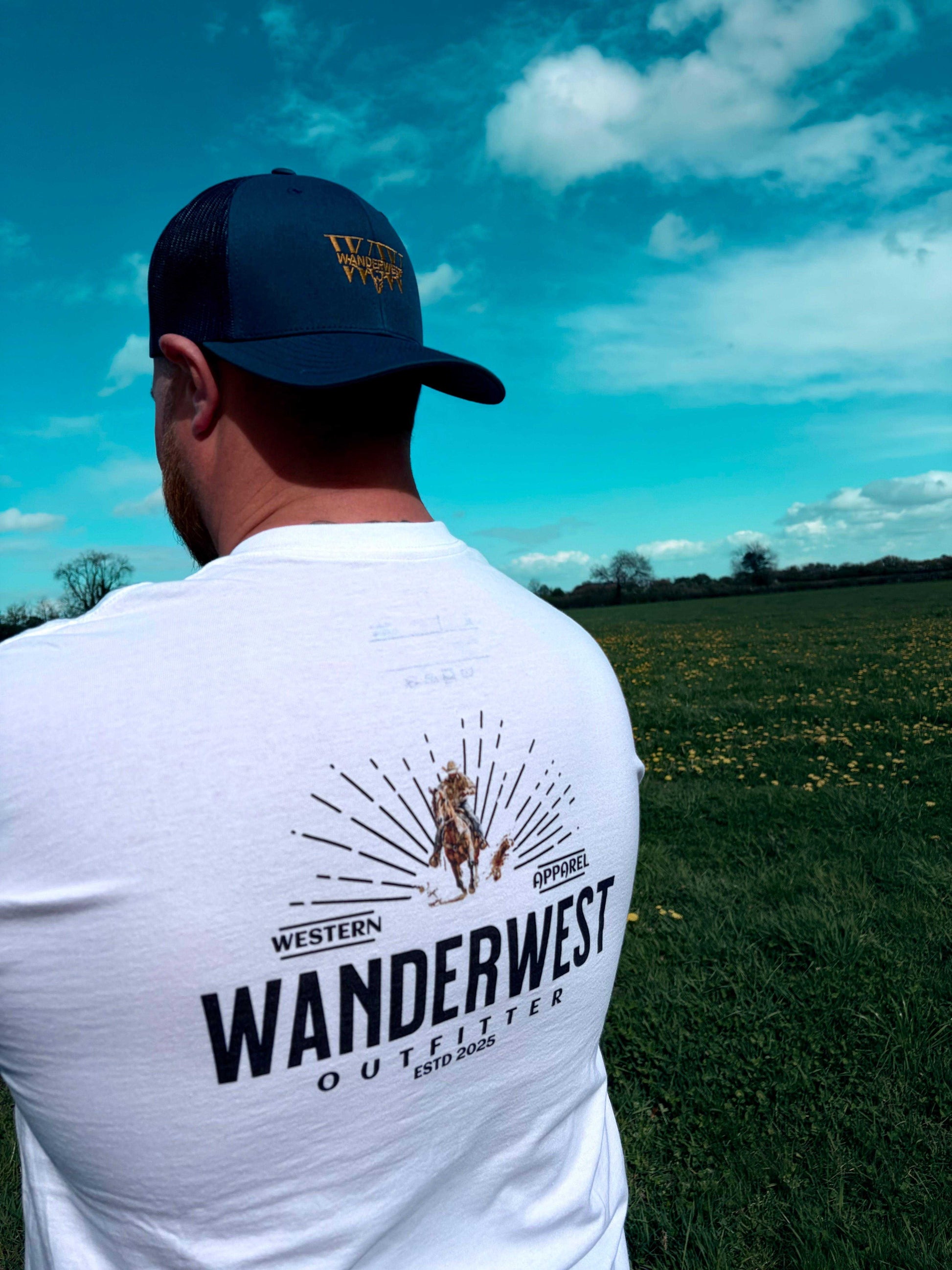 Embrace the Cowboy Code with the Cowboy Code Tee. This 100% cotton tee offers comfort, a structured fit, and a powerful message for everyday wear. Navy Coastal Drift trucker hat styled for western streetwear and UK summer fashion