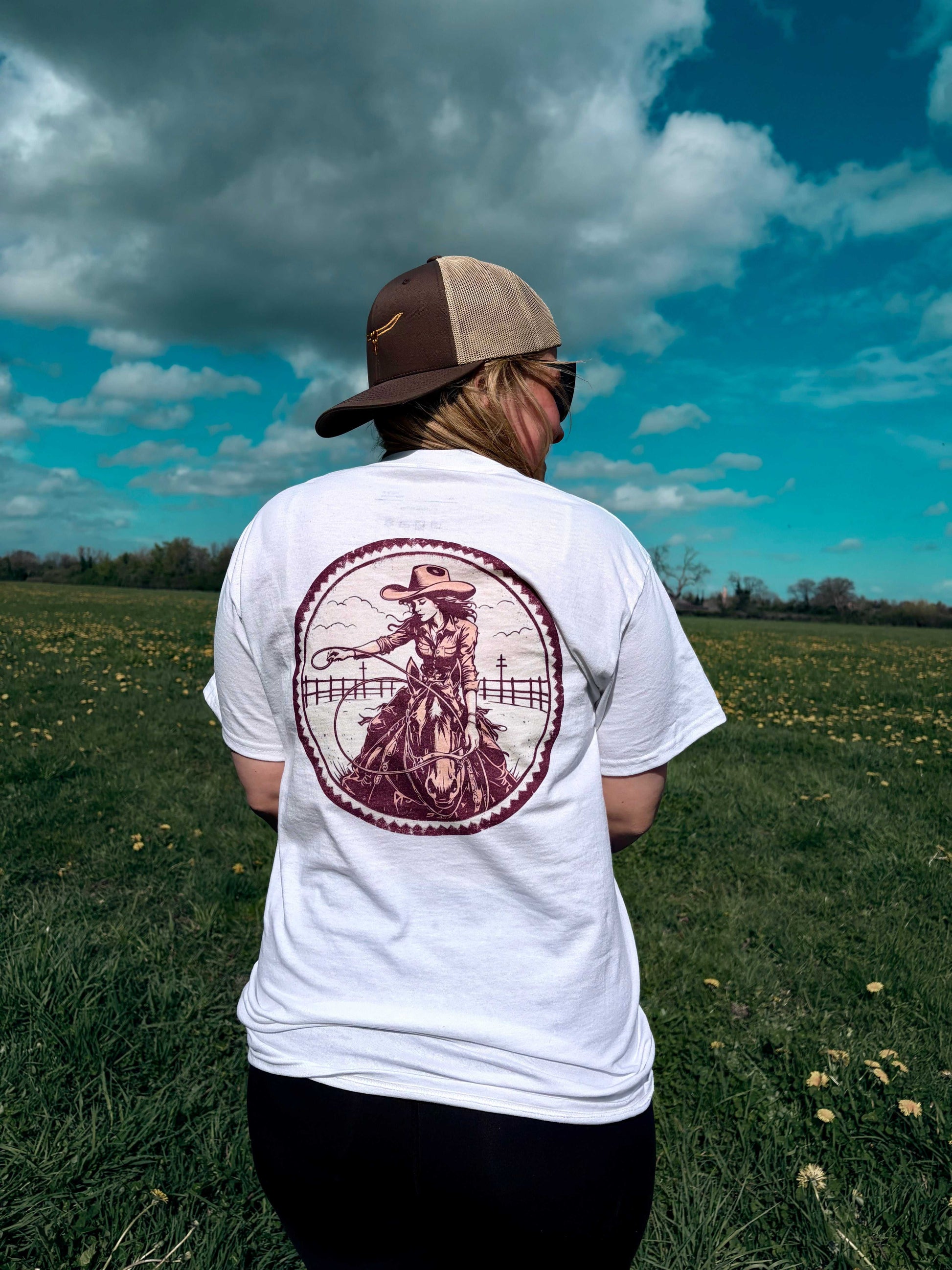 Discover the Prairie Rose Tee: a 100% cotton, unisex shirt designed for effortless style, comfort, and perfect layering. Experience versatile fashion today!